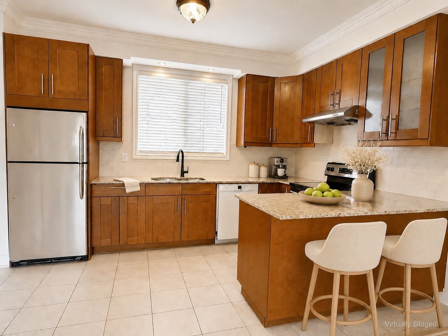 Virtually staged overview of kitchen island and refrigerator area